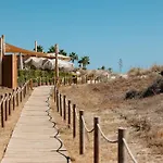 Beachfront With Terrace, Pool And Tennis Court In Costabella,